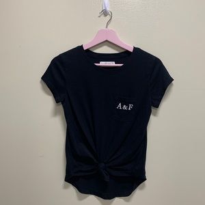 Brand new Abercrombie and Fitch black tee with cute tie detail in the front.